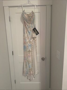 Primavera Couture Beaded White Dress with Pastel Blue and Pink Accents
